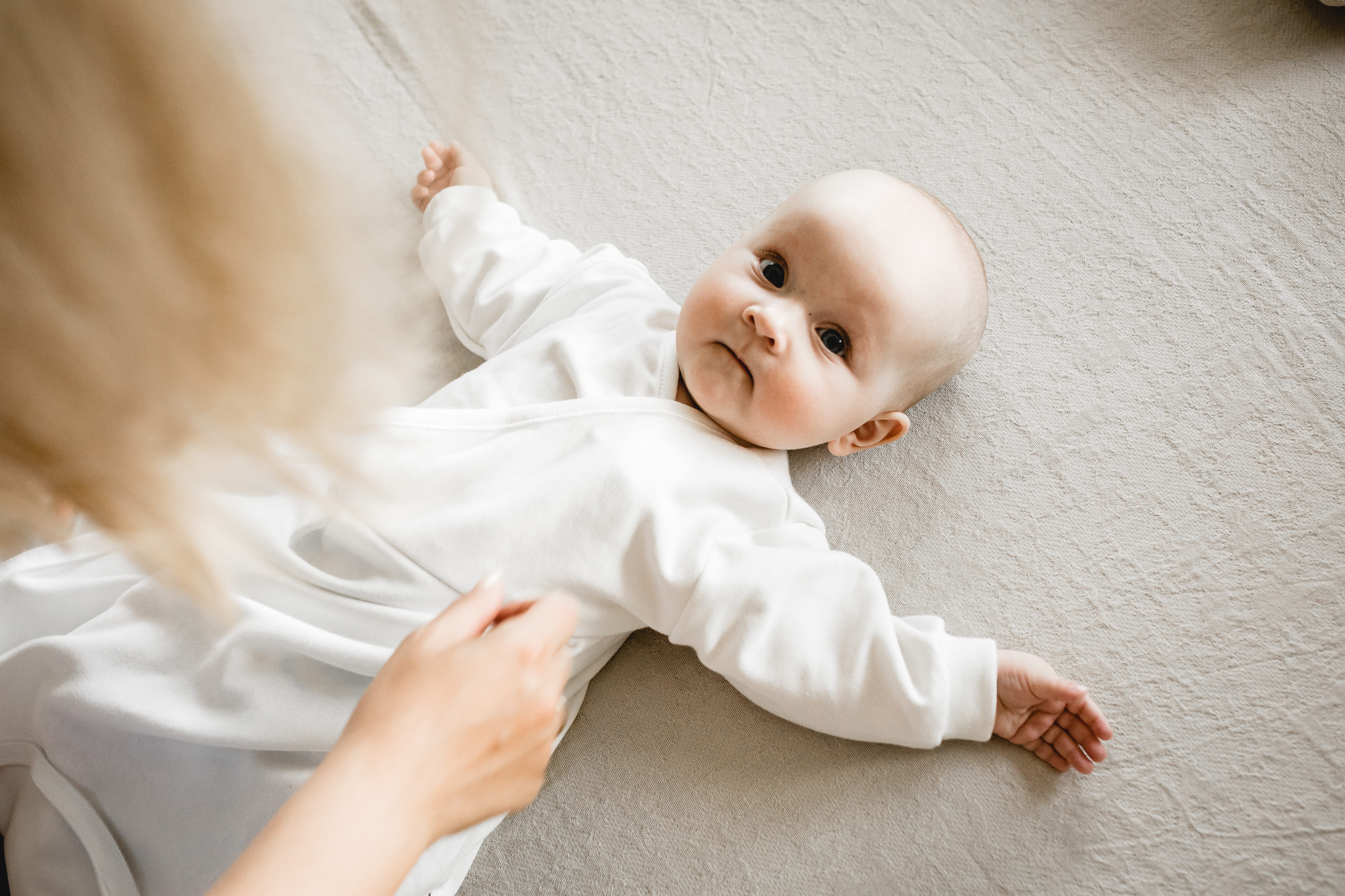 Was trägt das Baby unter dem Schlafsack? TOG-Werte erklärt